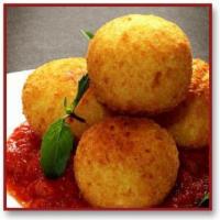 4 Rice Balls · Served with a side of Italian tomato sauce.