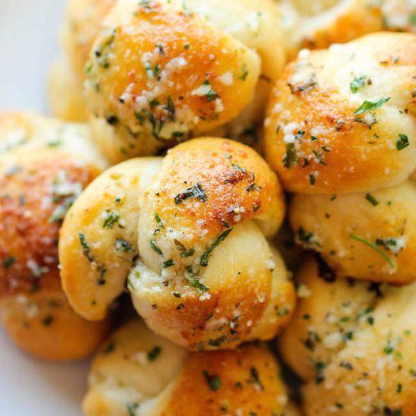 6 Garlic Knots · Served with side of Italian tomato sauce.