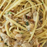 Linguine with Clam Sauce · Red or white. Chopped baby clams sauteed with fresh garlic and oil or marinara sauce.
