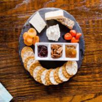 Landon Cheese Board · A selection of artisanal cheese, fruit preserves, fresh fruit garnish, seasonal nuts and cra...