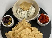 Spinach Dipper · Spinach artichoke dip, crisp tortilla chips, olive mix, roasted tomatoes. Served hot or cold.
