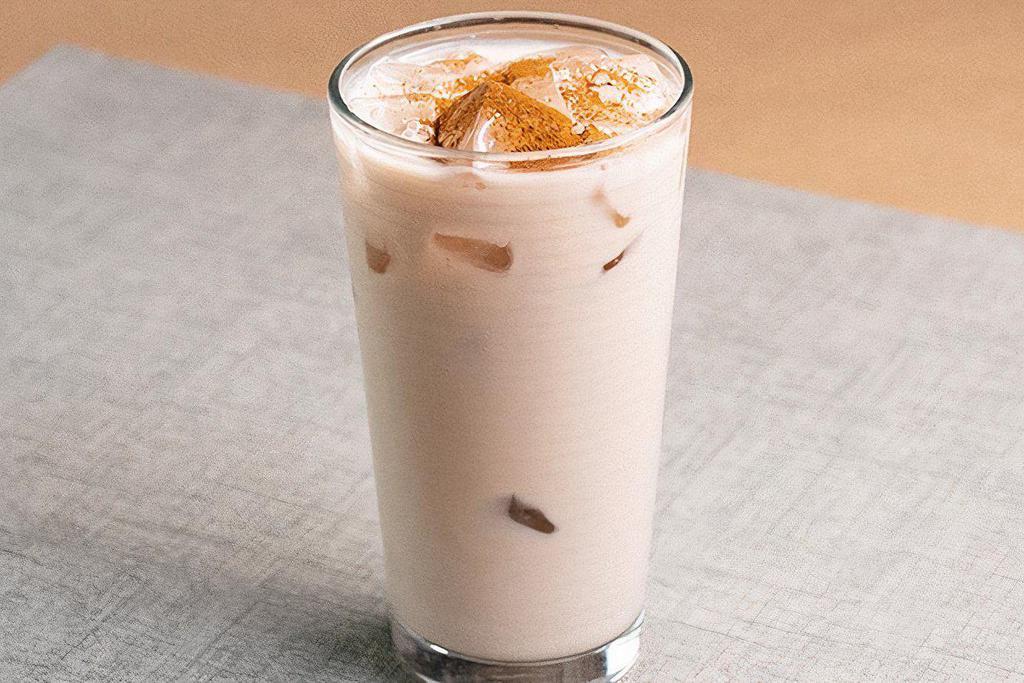 Iced Chai · A delicious Chai extract with whole milk over ice.