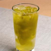 Iced Matcha Tea · A Japanese Ceremonial matcha green tea whisked with water over ice.