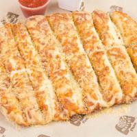 Cheezy Bread · Fresh-baked bread strips with our signature 3 cheeses and garlic sauce. Served with a side o...