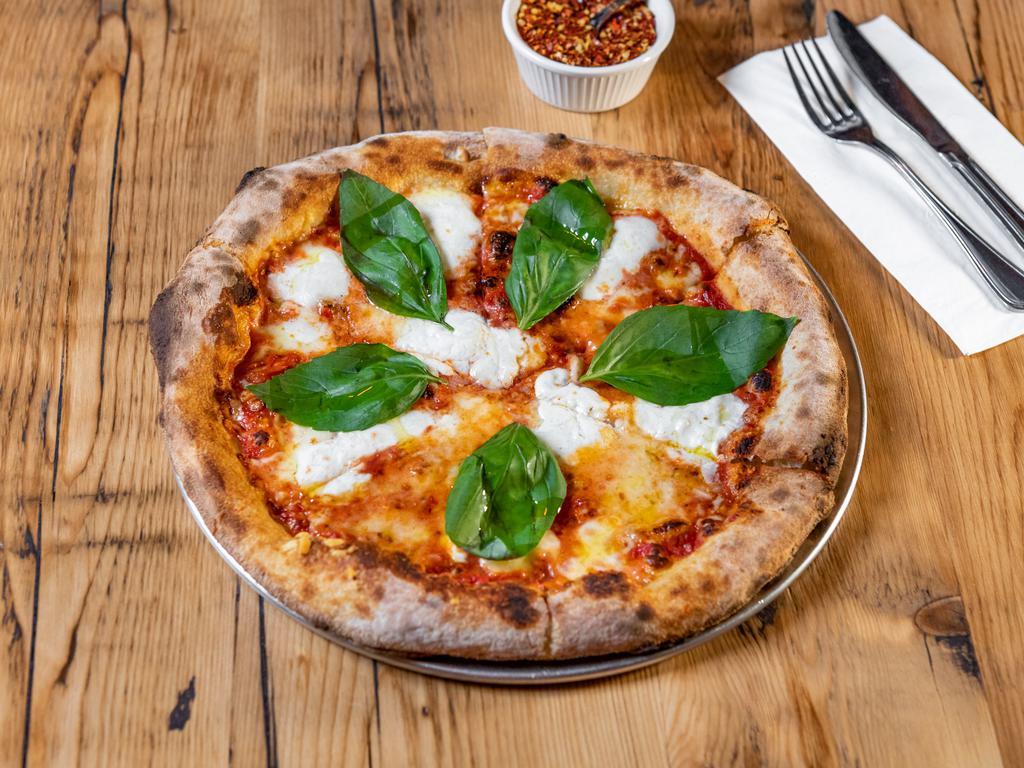 Margherita Pizza (brick oven) · Classic with san marzano tomatoes, fresh basil and homemade fior di latte mozzarella.