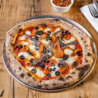 Napolitana Pizza · Fior di latte mozzarella, roasted cherry tomatoes, anchovies, black olives.