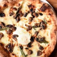 Umami Explosion Pizza · Taleggio cheese, fior di latte, smoked mozzarella, roasted  mushrooms, sage, egg on top, spr...
