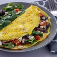 Greek Omlet · 2 eggs, olives, onion, peppers, feta cheese and spinach.