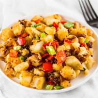 Home Fries · Home fries made with fresh potatoes, onion and peppers with salt and black pepper.