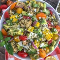 Pesto Chicken Salad · Pesto chicken, broccoli, cranberry, carrots and peppers.