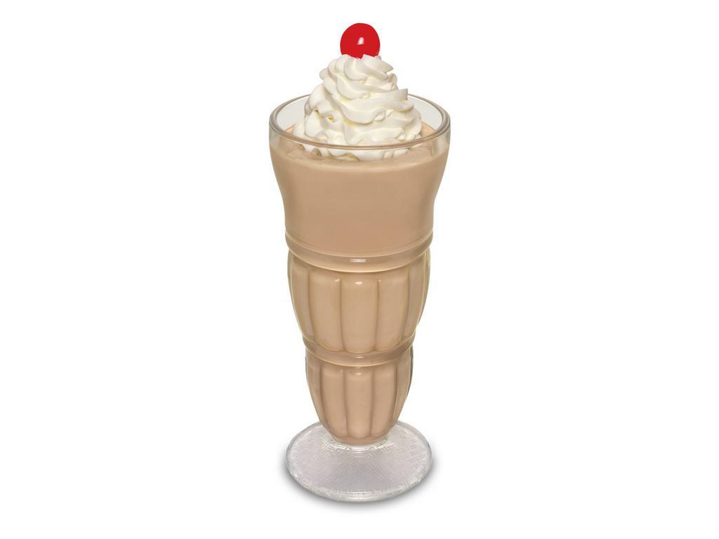 Chocolate Milkshake · Irresistible, thick, hand dipped chocolate milkshake made with real milk. Topped with whipped cream and a cherry.