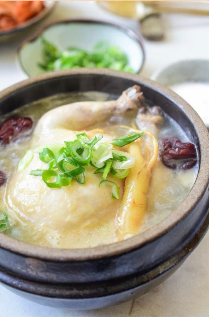 Samgye Tang · Chicken stuffed with sweet rice, ginseng, garlic and jujube simmered in chicken broth. 