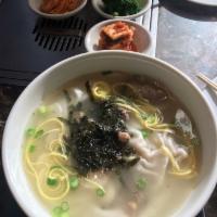 Duk Guk · Rice cake soup with beef and scallion in beef broth. 