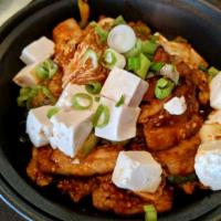Jae Yook Kimchi · Pork belly sauteed with kimchi and hot peppers in a spicy korean red chili sauce