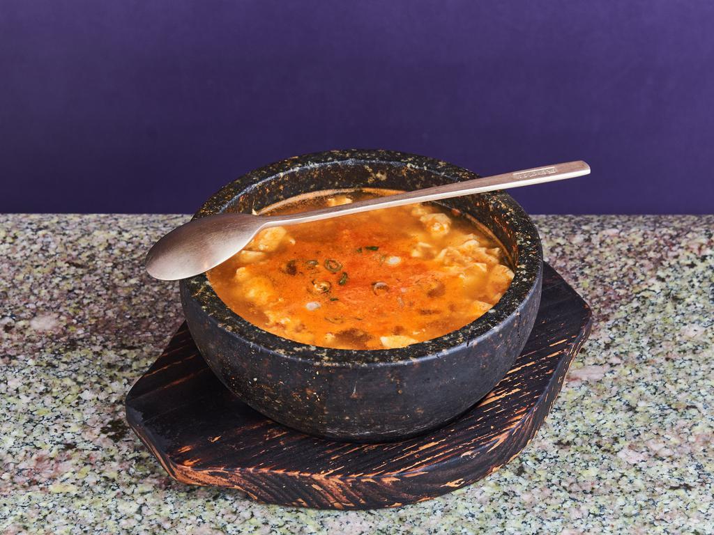 Soon Doo Boo · Spicy red chili stew with organic silken tofu (beef, seafood, kimchi, vegetable, plain)
