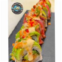 Wild Tuna Tataki Roll · Inside: spicy yellowtail, avocado, spring mix. Top: fresh tuna, avocado, spicy ponzu, massag...