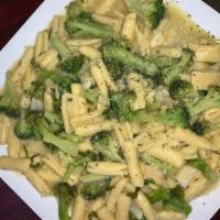 Cavatelli and Broccoli · Small pasta shells.
