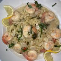 Shrimp Scampi · Shrimp sauteed in a white wine lemon and garlic sauce.
