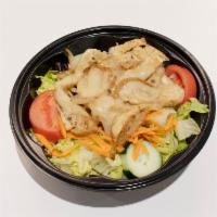 4 oz. Grilled Chicken Salad · Prepared with fresh lettuce, carrots, red cabbage, tomato and cucumber. Served with onions a...