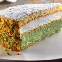 Pistachio Cake · Layers of sponge cake ,pistachio and ricotta creams, decorated with pistachio pieces 