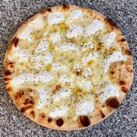 White Pizza · Extra virgin olive oil, salt, pepper, oregano, ricotta and mozzarella. Fresh dough made dail...