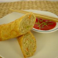 1 Piece Vegetable Egg Roll · Crispy dough filled with minced vegetables.