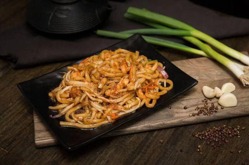 Stir-Fried Udon with Seafood (海鮮炒烏冬) · Thick wheat flour noodles.