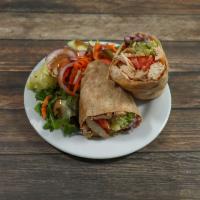 Grilled Chicken Wrap · Grilled chicken, lettuce, tomatoes, roasted peppers, basil and balsamic vinegar.