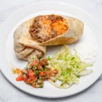 Pollo Burrito · Grilled marinated chicken. Flour tortilla stuffed with rice, cheese, and refried pinto beans...