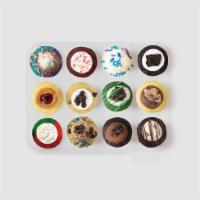 Baker's Dozen 12-pack · Taste all the cupcakes on our current seasonal menu in this bite-size sampler! Includes our ...