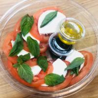 Caprese Salad · Mozzarella, tomato, basil, balsamic, extra virgin olive oil.