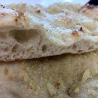 SQ Garlic Bread! - Half Pan (10 squares) · Garlic, parmesan and e.v.o.o. with our bread made with Italian flour!