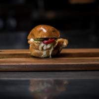 The Urban Cowboy · Crispy chicken breast slider with queso, fresh jalapenos, and our texsauce.