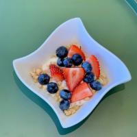 Yogurt Parfait · Vanilla yogurt, almond granola, seasonal fruit
