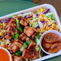 BBQ Southwest Chicken Salad · BBQ Grilled Chicken, Romaine Lettuce, Cabbage, Corn and Poblano Relish, Green Peppers, Chedd...