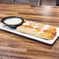 Soft Pretzel Sticks · Served warm and lightly salted. Cheese sauce on side. 