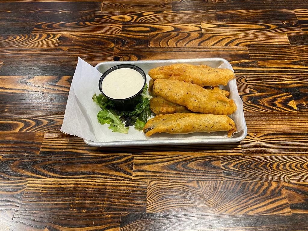 Fried Pickles  · Crunchy and delicious. Five hand-battered spears deep-fried to crispy perfection. Served with housemade horseradish/ranch for dipping. 