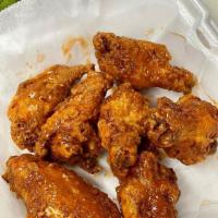 Buffalo Wings · 6 pieces. Includes 1 sauce per order and bleu cheese.