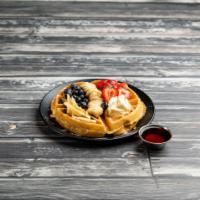 Fresh Fruit Waffle · Fresh slices (in season) of strawberries, blueberries (in season), apples and banana with wh...