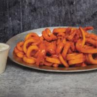 Buffalo Fries · Signature curly fries tossed with our signature buffalo sauce!
