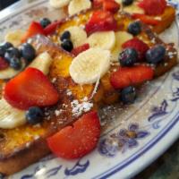 Old Fashion French Toast · Served with butter and syrup.