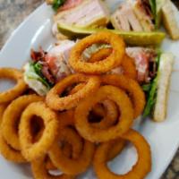 Turkey Club with Bacon Sandwich · Turkey, bacon, lettuce, tomato, mayo.