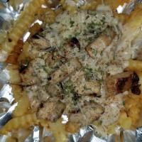 Loaded  fries · French fried potatoes covered in creamy Alfredo, topped with your choice of grilled shrimp o...