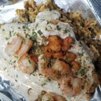 Loaded catfish · Fried catfish fillet on a bed of dirty rice, covered with creamy Alfredo sauce and grilled s...