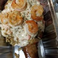 Kandy's Special  · Dirty rice or pasta topped with seafood Alfredo and grilled shrimp. 