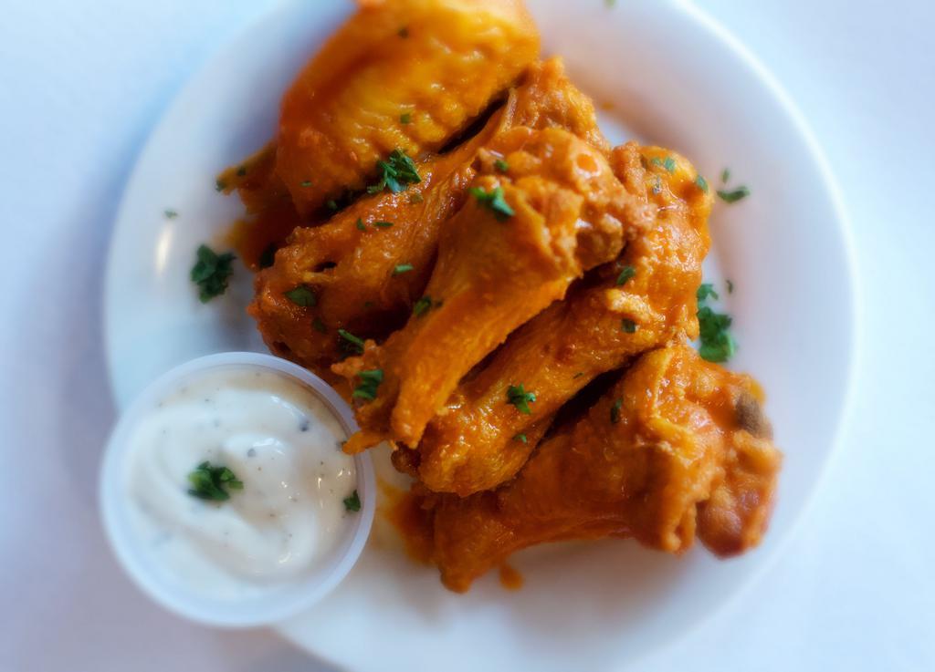 Buffalo Wings 20 pcs ·  Served with blue cheese