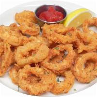 Fried Calamari-Napoletan Style · Tender calamari, coated with seasoned flour and deep fried to perfection. served with Marina...