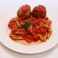Ziti with tomato sauce with meatball · served with bread and butter