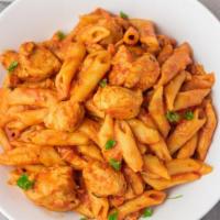 Penne ala vodka with chicken · Served with bread and butter