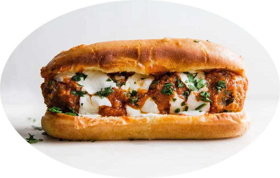 Meatballs Parmigiana Sandwich · Mozzarella and tomato sauce.